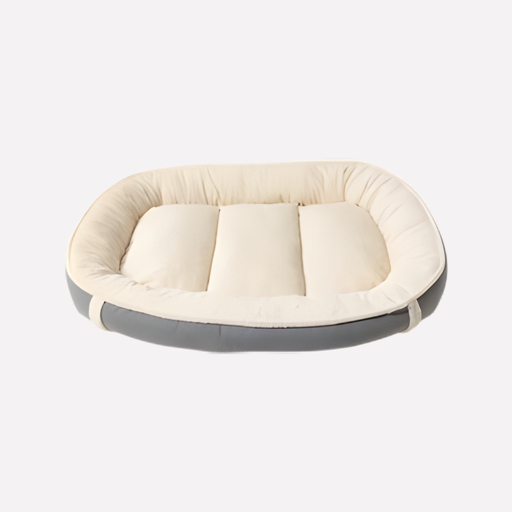 Soft, round dog bed featuring raised edges and a washable cover, designed for ultimate pet relaxation.