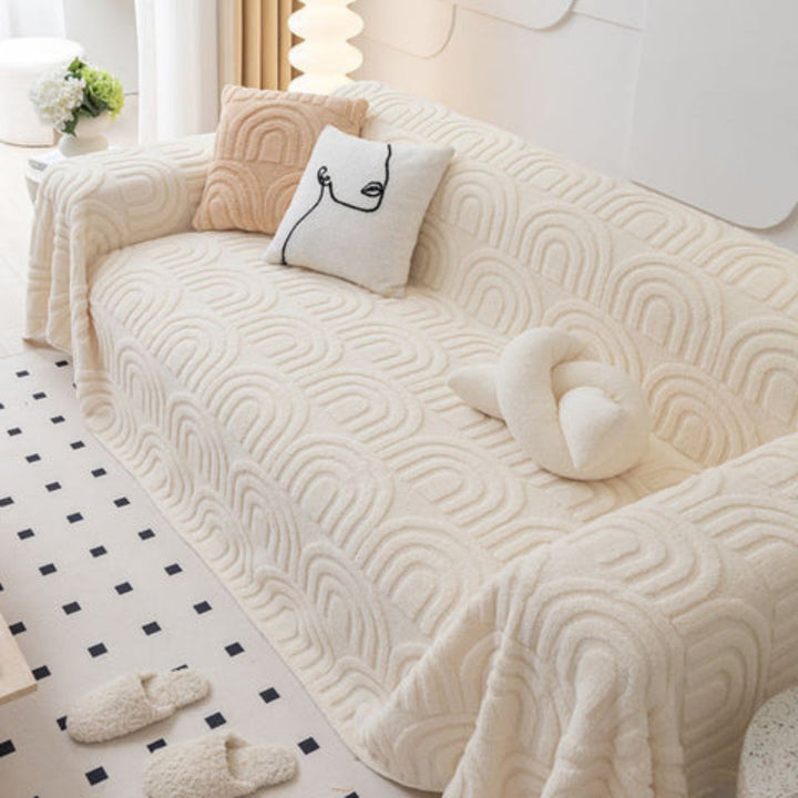 Anti-slip plush sofa cover with a unique wave pattern, perfect for adding comfort and protecting living room furniture.