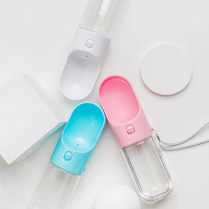 Dog accessories: Portable water bottle with integrated dispenser for hydration