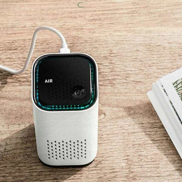 Pet air purifier operating silently, indicated by a soft blue light, enhancing home air quality.