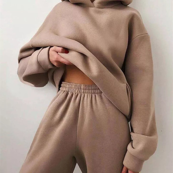 Stylish women's two-piece Serenity set featuring a relaxed-fit hoodie & comfortable joggers for casual wear.