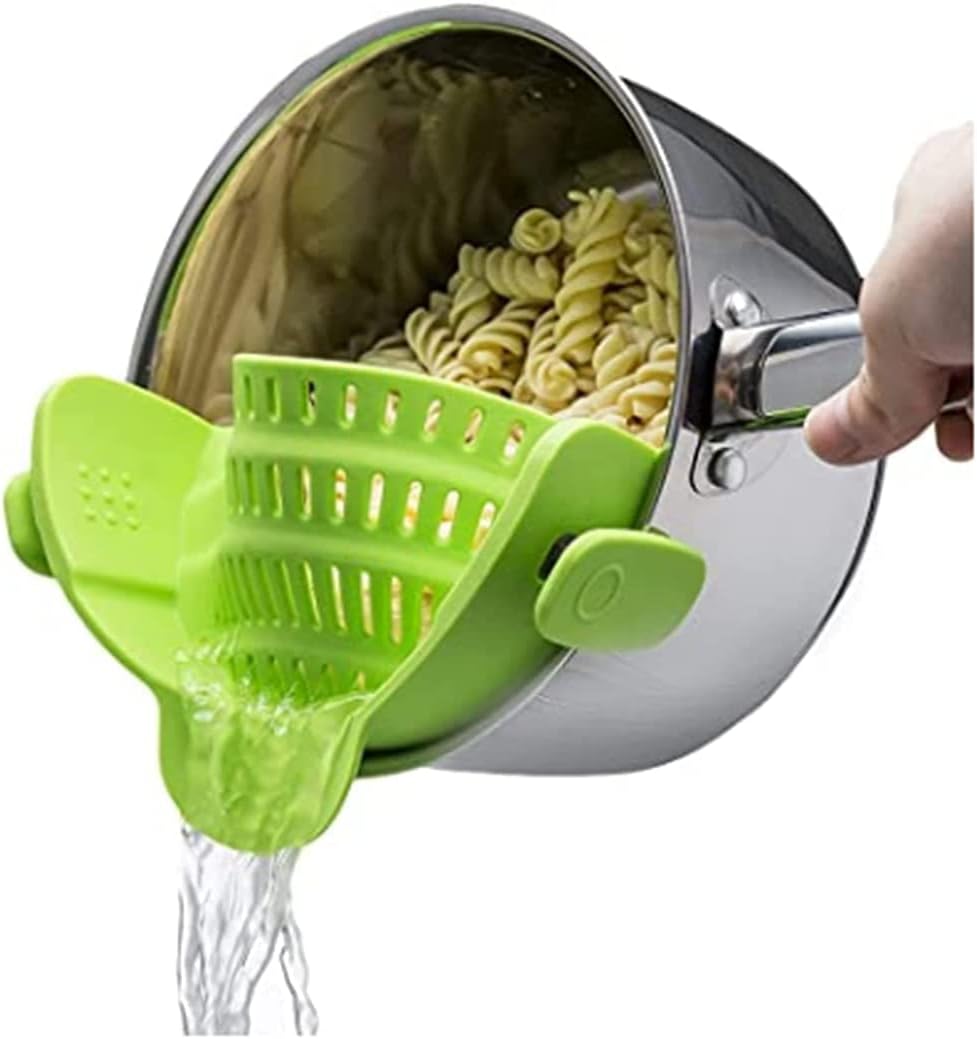 Heat-resistant grey clip-on silicone strainer for pasta & vegetables. Practical kitchen draining tool.