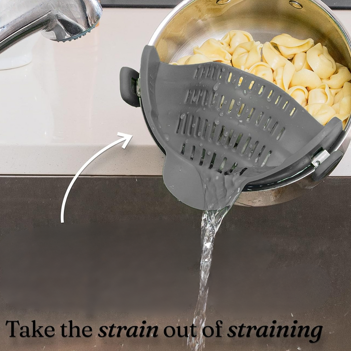 Draining pasta & veggies effortlessly with a heat-resistant silicone clip-on colander. Smart kitchen gadget.