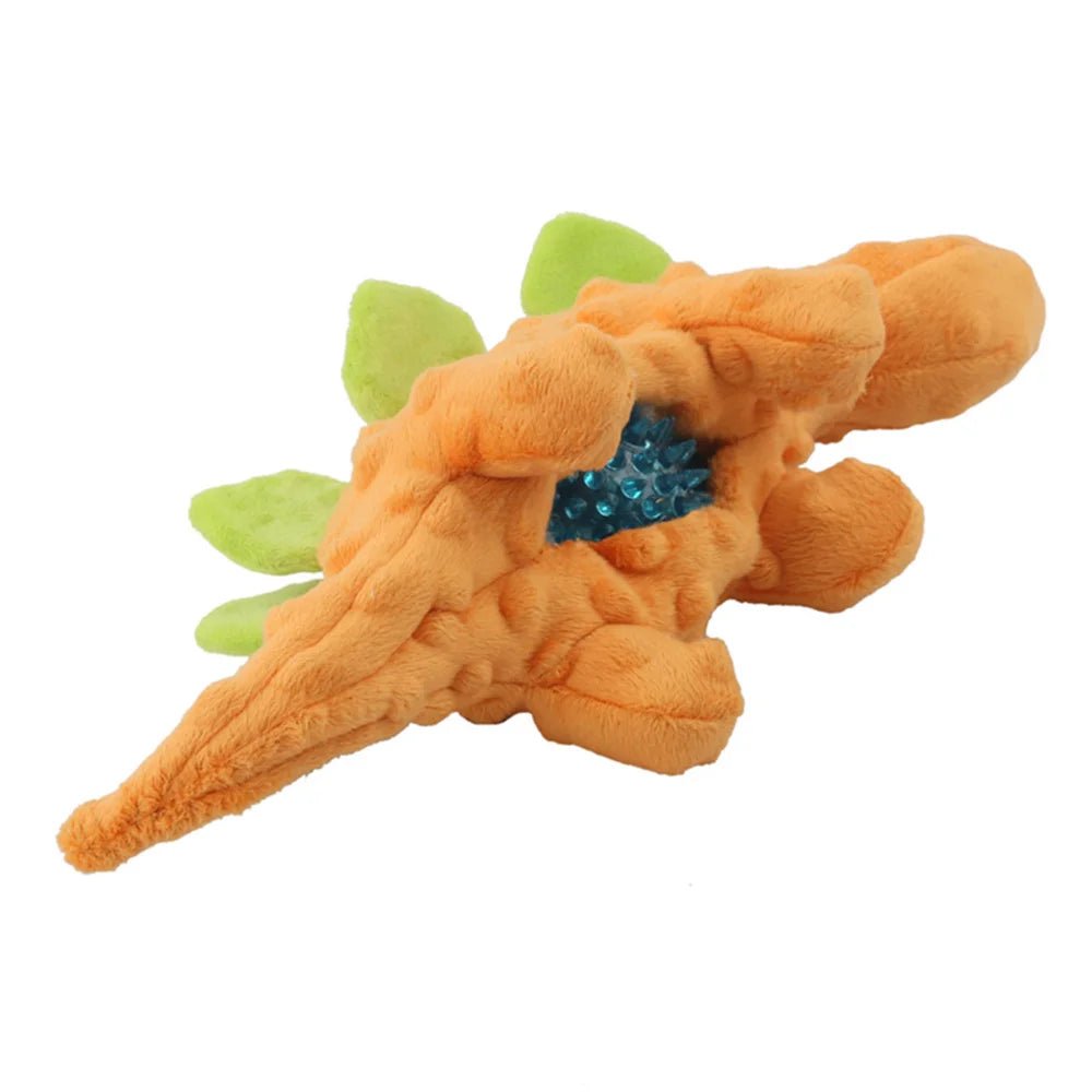 Dog happy with new interactive plush chew toy, stimulating play and improving dental hygiene.