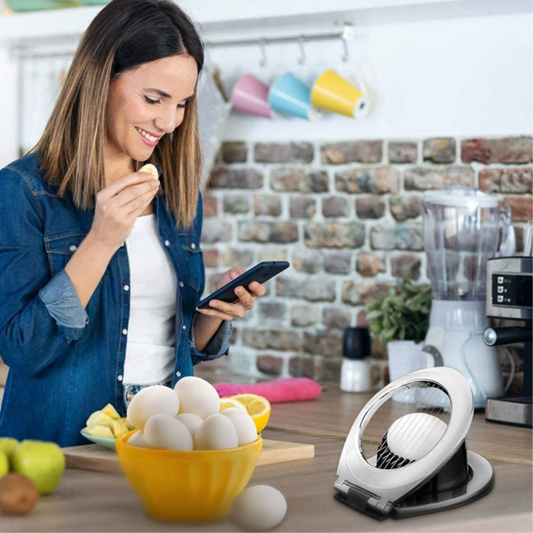 Get perfectly sliced eggs & fruit with this versatile stainless steel egg slicer & fruit cutter.