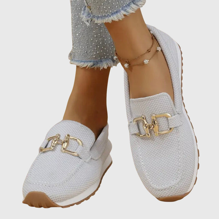 Chic women's loafers with advanced arch support, designed for style and walking comfort.