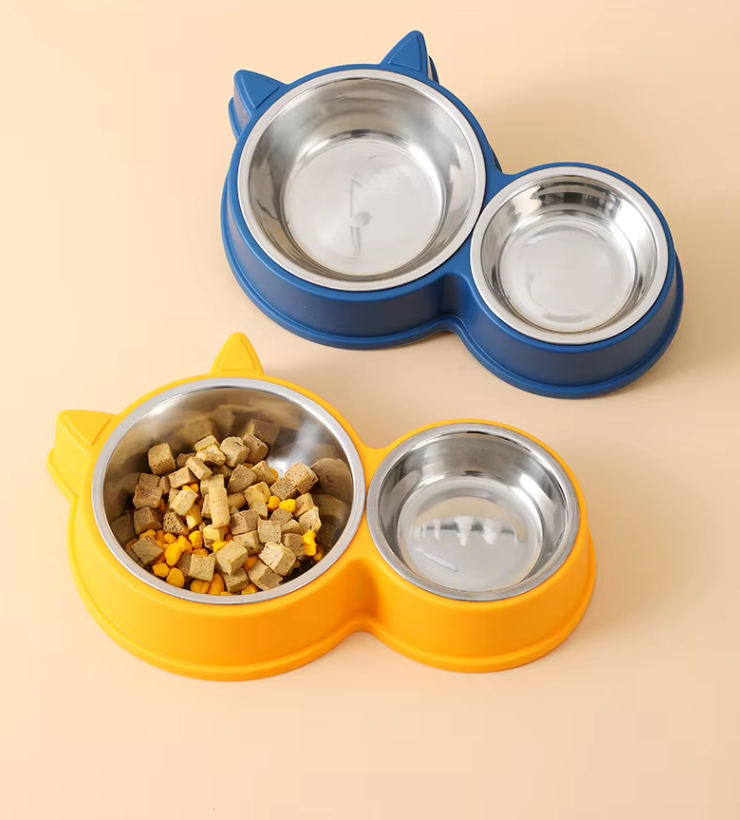Cute cat ear non-slip pet feeder with two stainless steel bowls on a silicone base