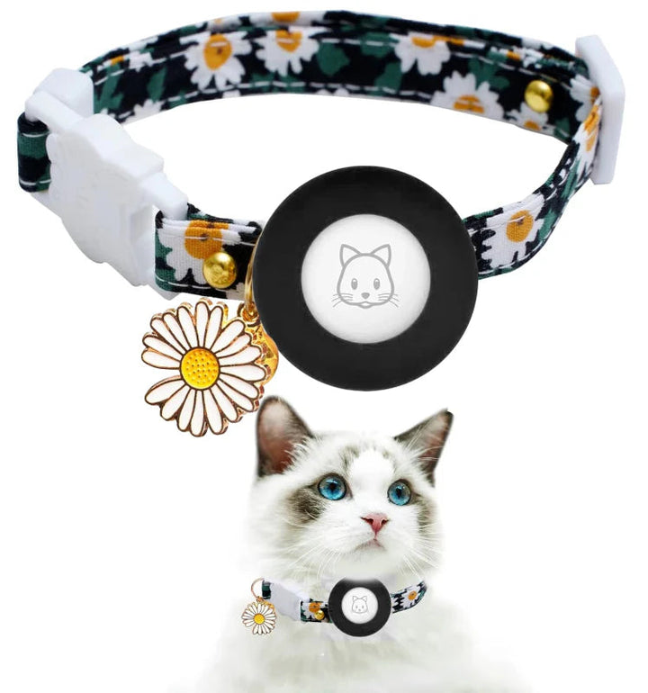 Close-up of a cat AirTag holder collar showing breakaway buckle, adjustable strap, and small safety bell.