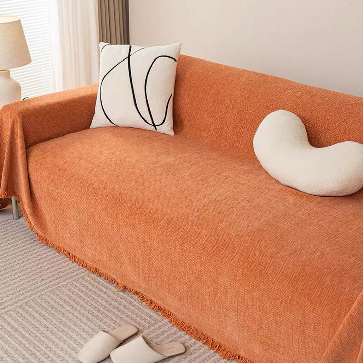 Unisex chenille herringbone couch throw draped over sofa, soft and wear-resistant furniture protector