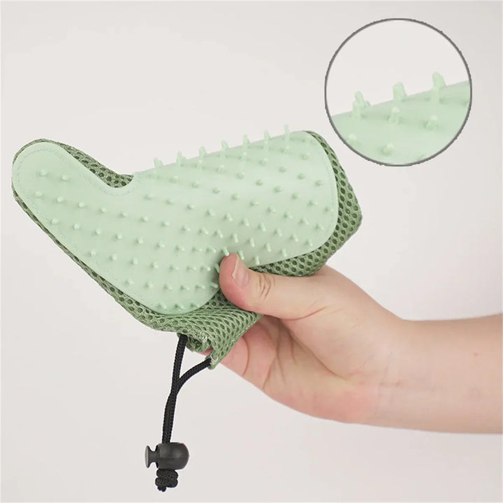 Pet grooming glove designed for gentle massage and thorough fur removal, keeping pets healthy