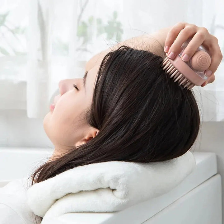 Soft silicone pet grooming massage brush with integrated shampoo dispenser for gentle pet care