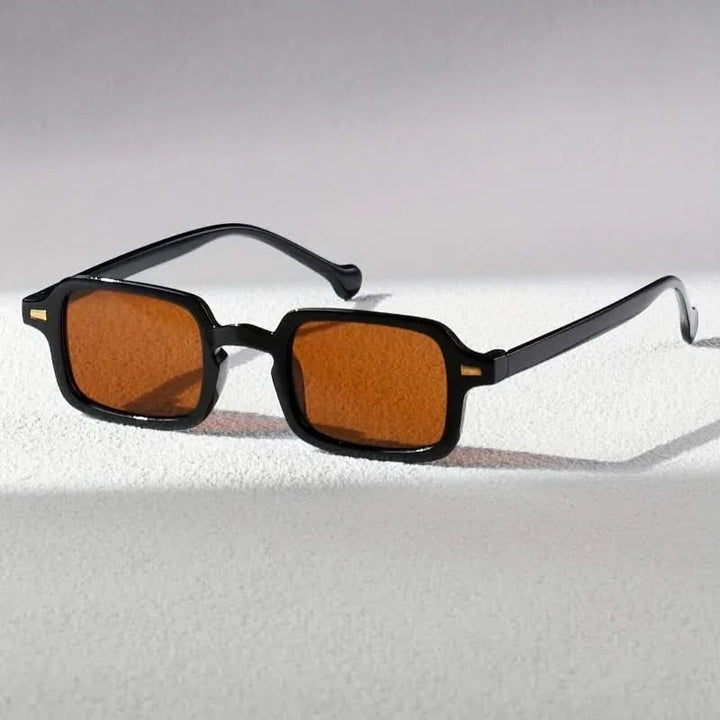 Classic unisex square sunglasses with anti-glare lenses. Stylish retro shades providing excellent eye protection.