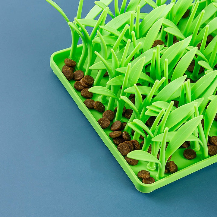 Non-slip dog feeding mat, silicone material, vibrant green grass design, keeps bowls in place