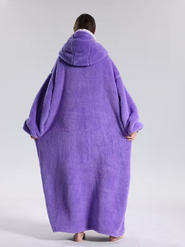 Snuggle up in this cozy oversized wearable blanket hoodie, pure comfort.