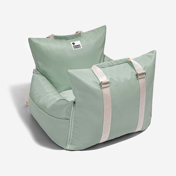 Waterproof pet travel bed with seat anchors for secure placement