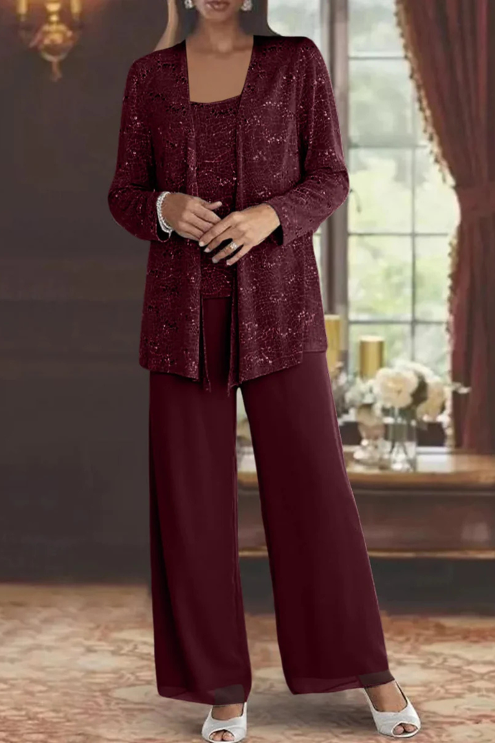 Modern women's three-piece formal evening set, elegant flowing design for a contemporary look.