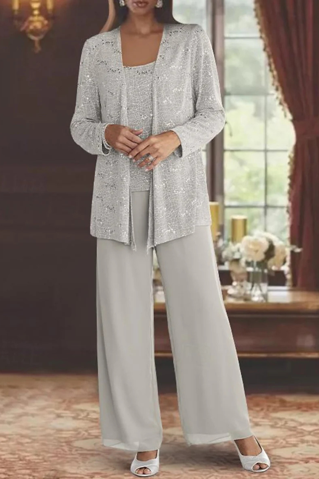 Elegant women's three-piece evening wear with a flowing silhouette, perfect for formal events.