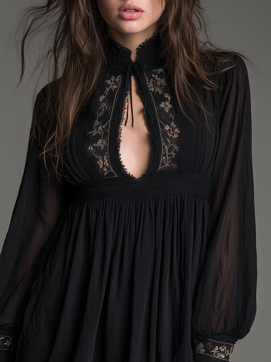 Trendy women's black mini dress, babydoll style, with high neck and keyhole detail. Ideal for evening & party wear.