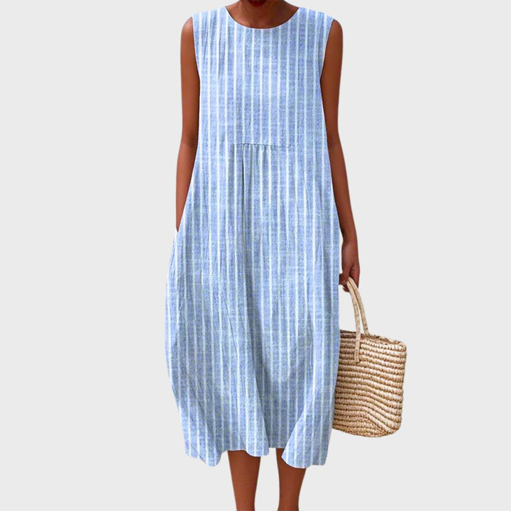 Sleeveless women's summer dress, knee-length, relaxed A-line fit, comfortable for casual daily wear.