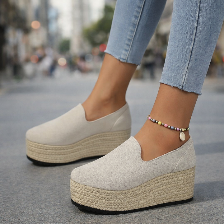 Women's comfortable espadrille platform slip-on shoes for summer casual fashion.