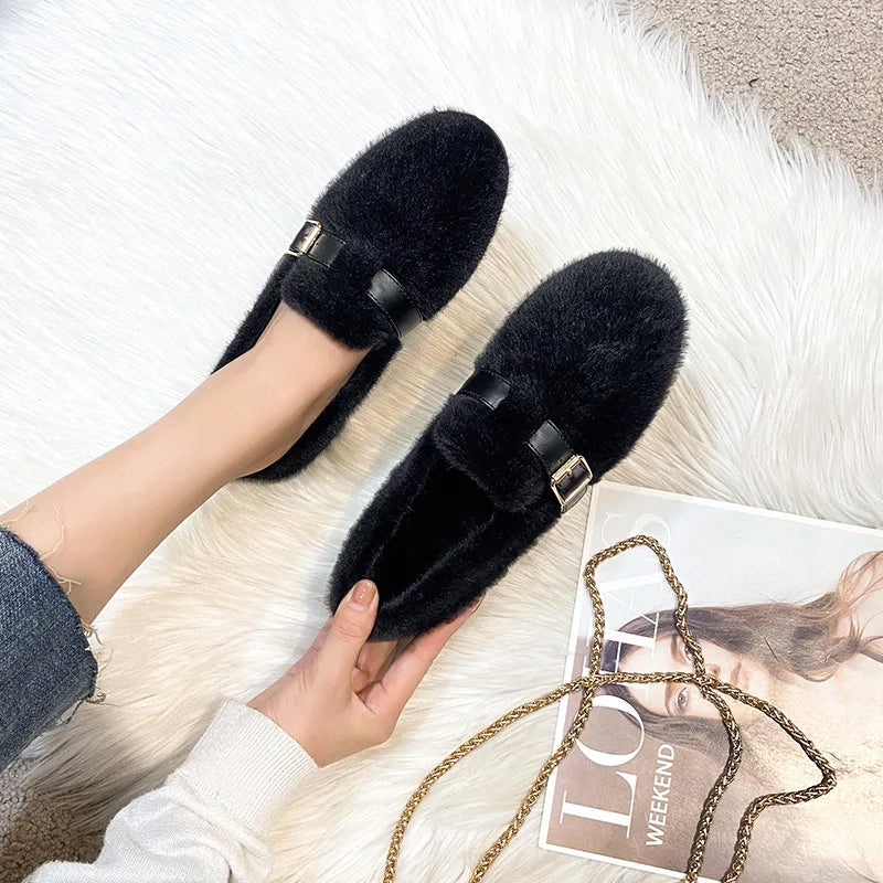 Close-up of soft plush women's flats, emphasizing texture & ultimate comfort. Cozy slip-on loafers for winter.