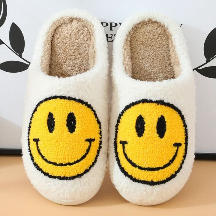 Women's winter warm footwear: super soft smiley slippers with a cozy lining and a robust non-slip sole.