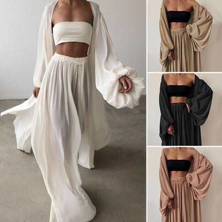 Women's elegant 3-piece summer outfit featuring a stylish blazer, top, and pants. Perfect for versatile wear.