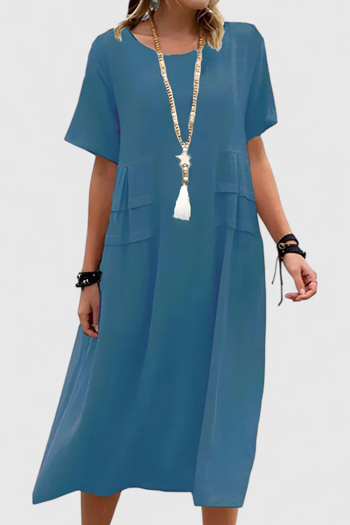 Feminine & sophisticated women's midi dress, an elegant choice for any occasion, from day to evening.