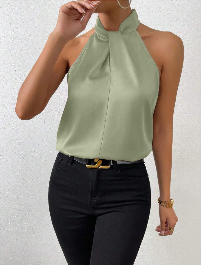Fashion-forward women's twist knot neck top. Elegant short sleeve, comfortable and versatile design.