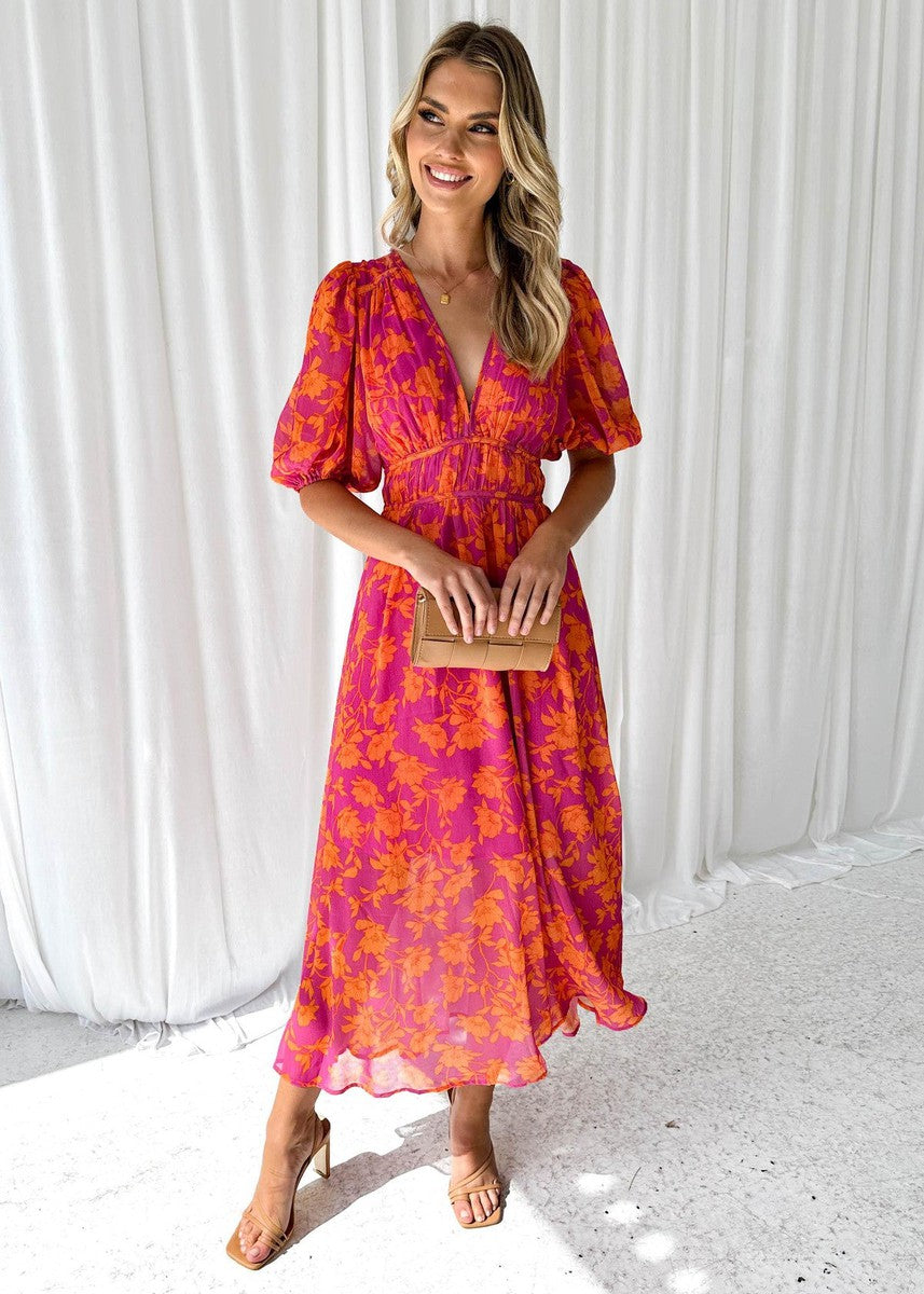 Orange floral midi wrap dress with puff sleeves for women, ideal elegant party or summer wedding guest attire.