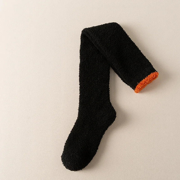 Soft, fuzzy knee high socks for women. Luxurious comfort for cold weather. Cozy solid color winter loungewear.