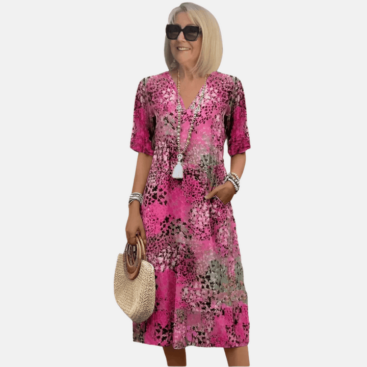 Effortless women's bohemian summer dress, loose fit V-neck, short sleeve printed sundress, great for casual vacation wear.