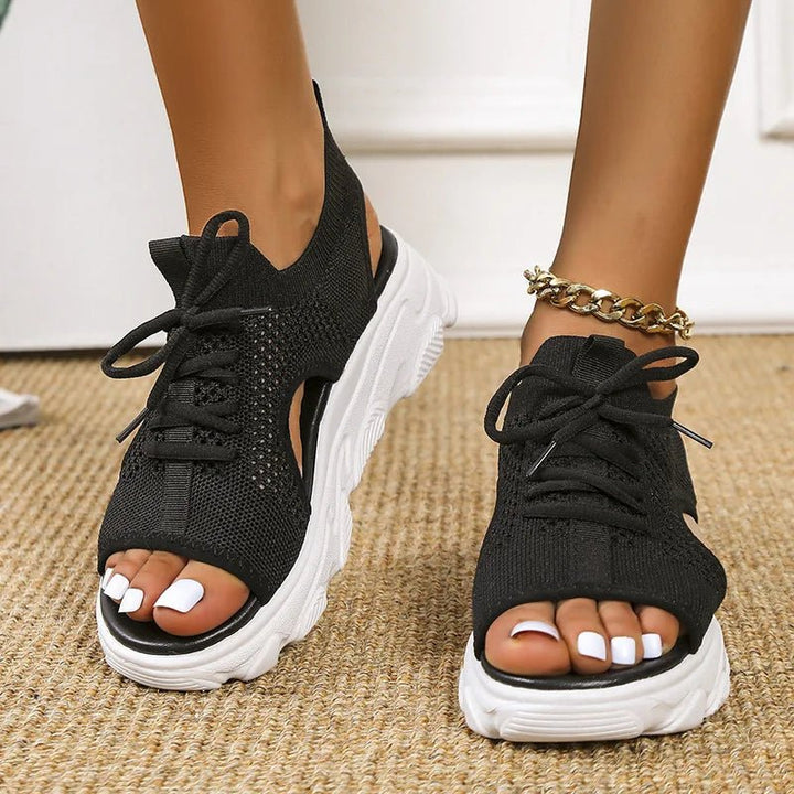 Women's open-toe platform sandals with stylish lace-up closure. Perfect for summer casual wear.