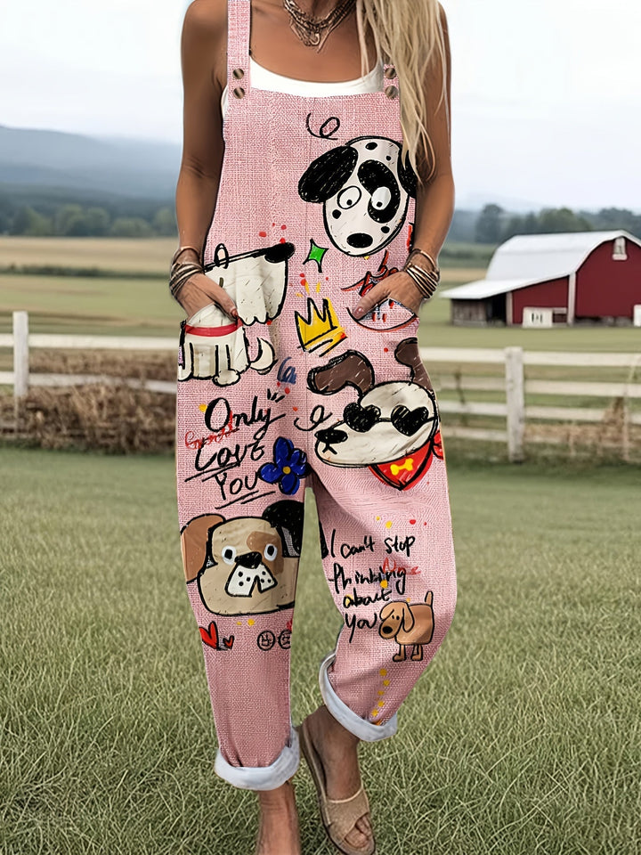 Women's playful dog print jumpsuit, adjustable straps, wide leg, pockets. Casual summer fashion.