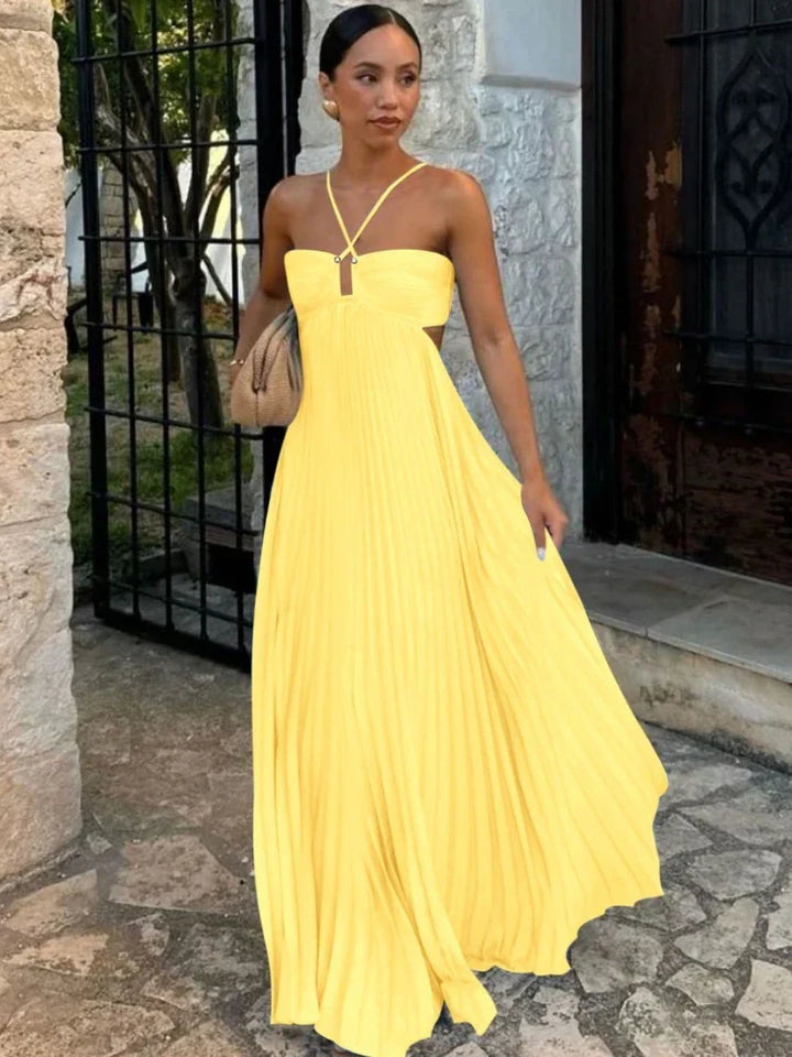 Elegant women's pleated maxi wedding guest dress with sleeveless design, perfect for formal occasions.