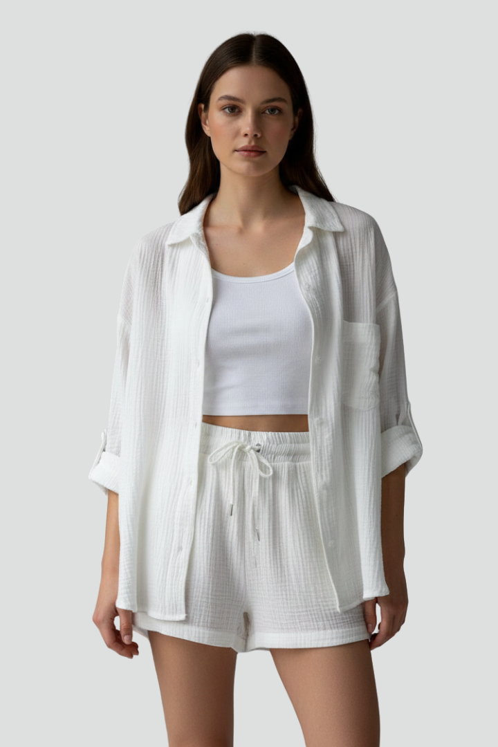 Relaxed fit women's shorts set with a stylish button-up top, ideal for lounge or casual wear.