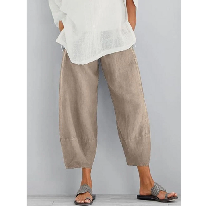 Women's relaxed fit black leisure pants, ideal for everyday comfort and casual wear with an easy pull-on design.