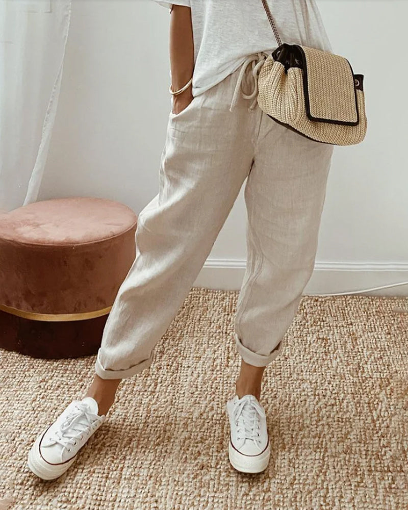 Women's relaxed fit linen jogger pants with drawstring waist, perfect for comfortable casual wear & summer style.