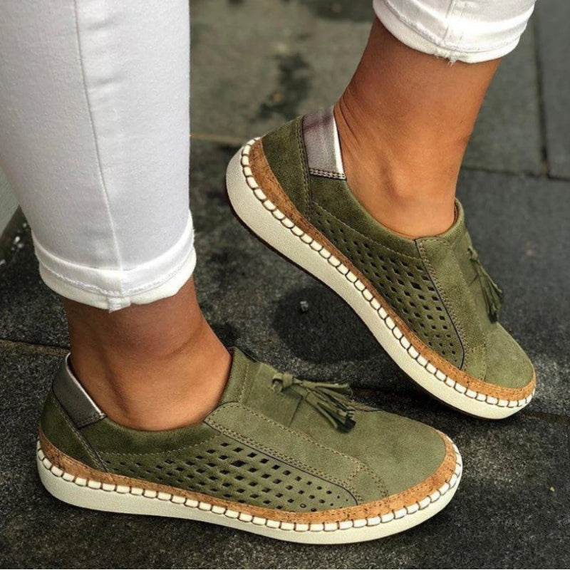 Women's slip-on walking sneakers for daily comfort. Lightweight, easy on/off design for casual wear.