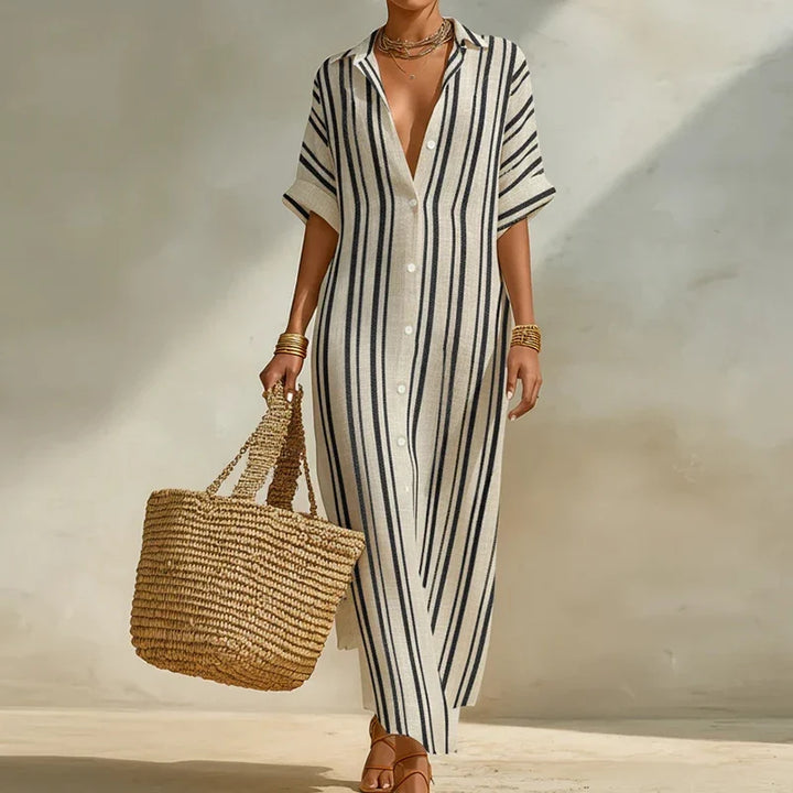 Women's striped long shirt dress with V-neck, three-quarter sleeves & relaxed fit for casual summer wear.