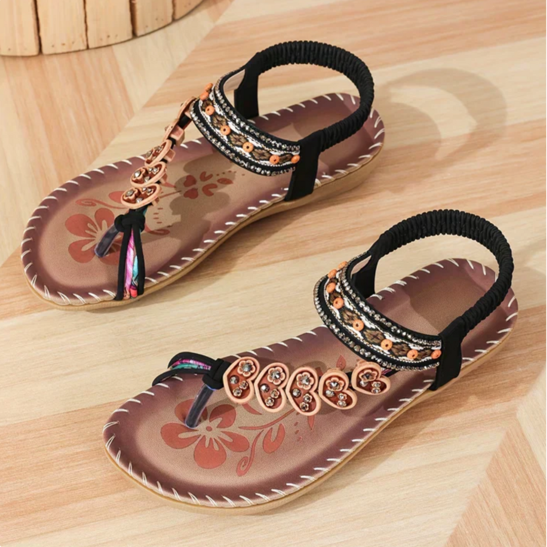 Stylish slip-on flat sandals for women, a chic and comfortable choice for summer.