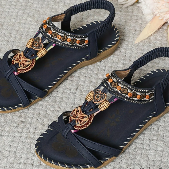 Stylish, comfortable women's flat sandals. Perfect open-toe slip-ons for everyday summer casual wear.