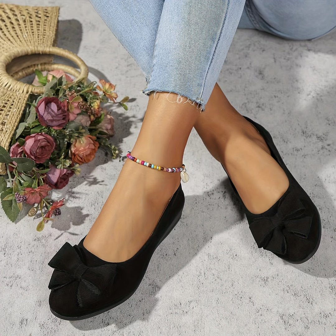 Versatile women's slip-on wedge footwear, ideal for stylish casual or elegant dressy occasions.