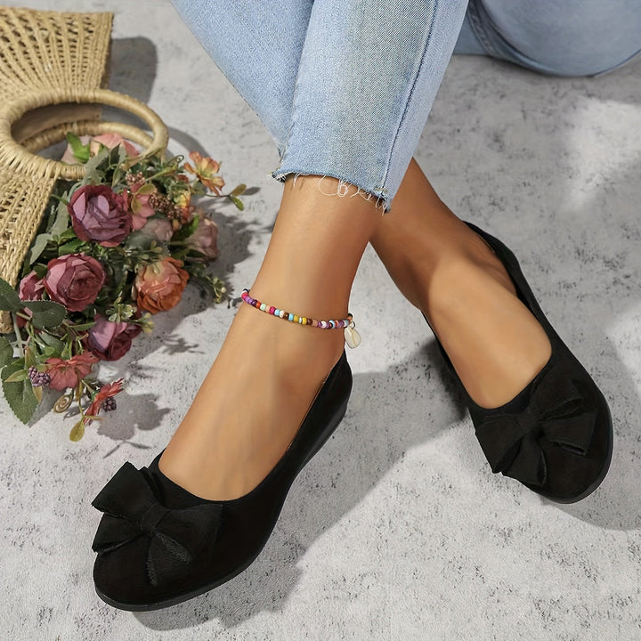 Versatile women's slip-on wedge footwear, ideal for stylish casual or elegant dressy occasions.