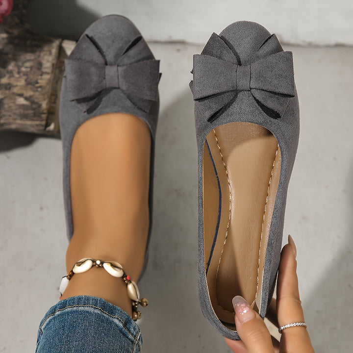Comfortable women's casual slip-on wedge shoes, perfect for stylish everyday wear.