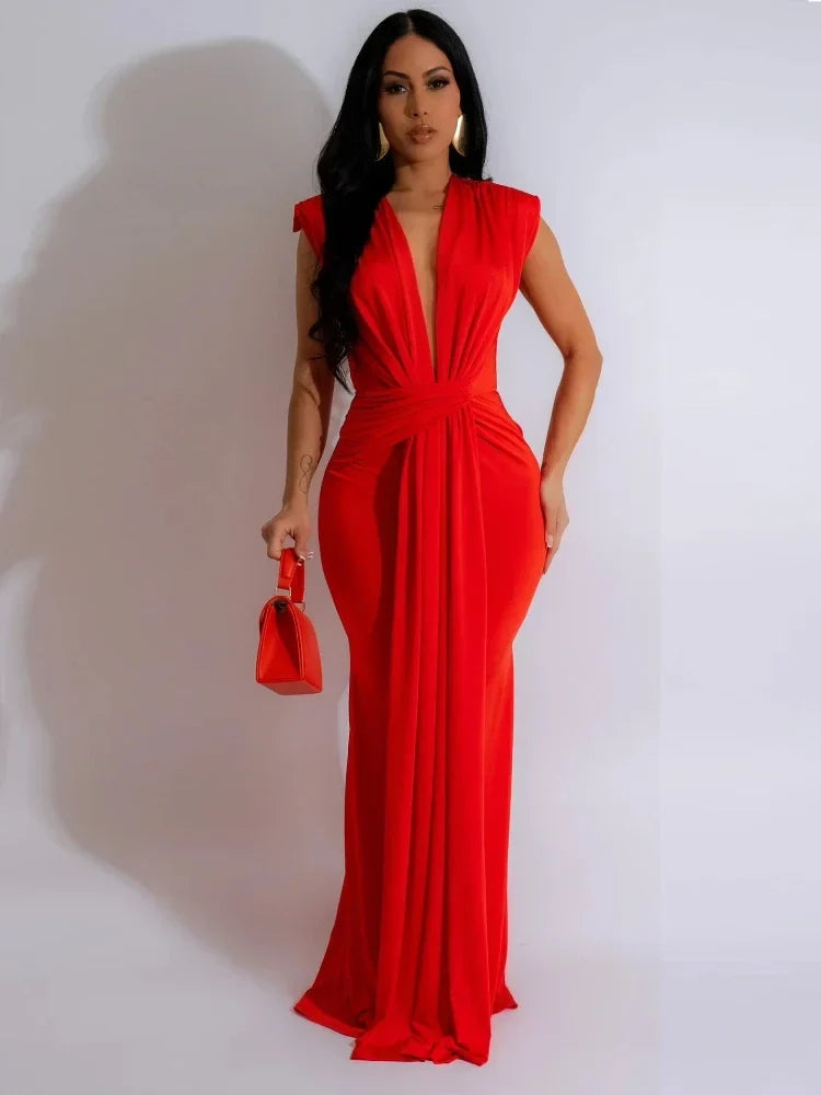Women's deep V-neck bodycon maxi dress with elegant draped detailing, perfect for evening wear.