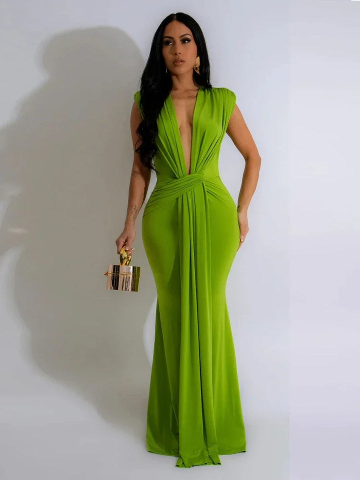 Stylish women's long bodycon dress with deep V-neck and sophisticated draped design, great for special occasions.