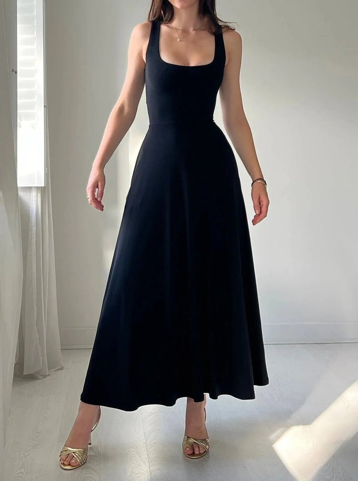 Women's flowy A-line midi dress with a square neck, perfect for elegant day or evening wear.
