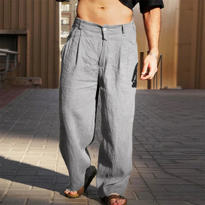 Men's comfortable pleated wide leg casual pants, ideal for a modern loose fit fashion statement.